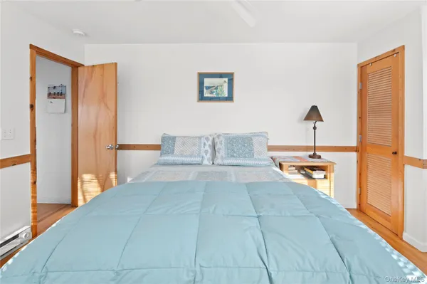 a view of a living room and bathroom
