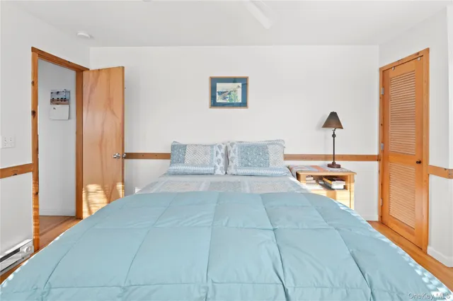 a view of a living room and bathroom