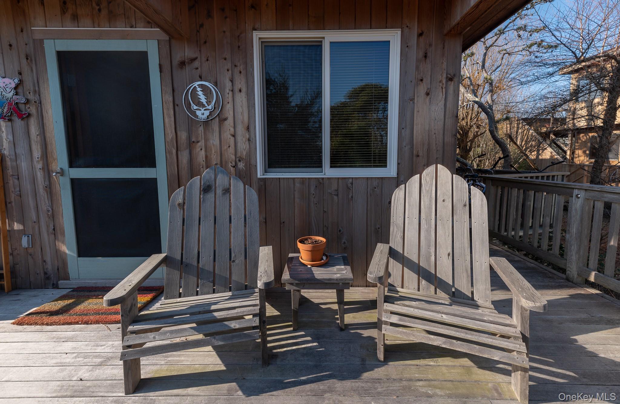 100 Clipper Way Ocean Beach, NY 11770 - Photo 31 of 46 a bench sitting in front of a building
