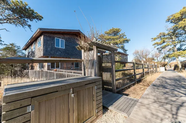 an aerial view of a house with outdoor space