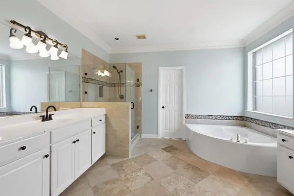 an empty room with closet and a ceiling fan