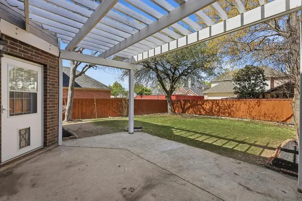 a view of a house with a back yard