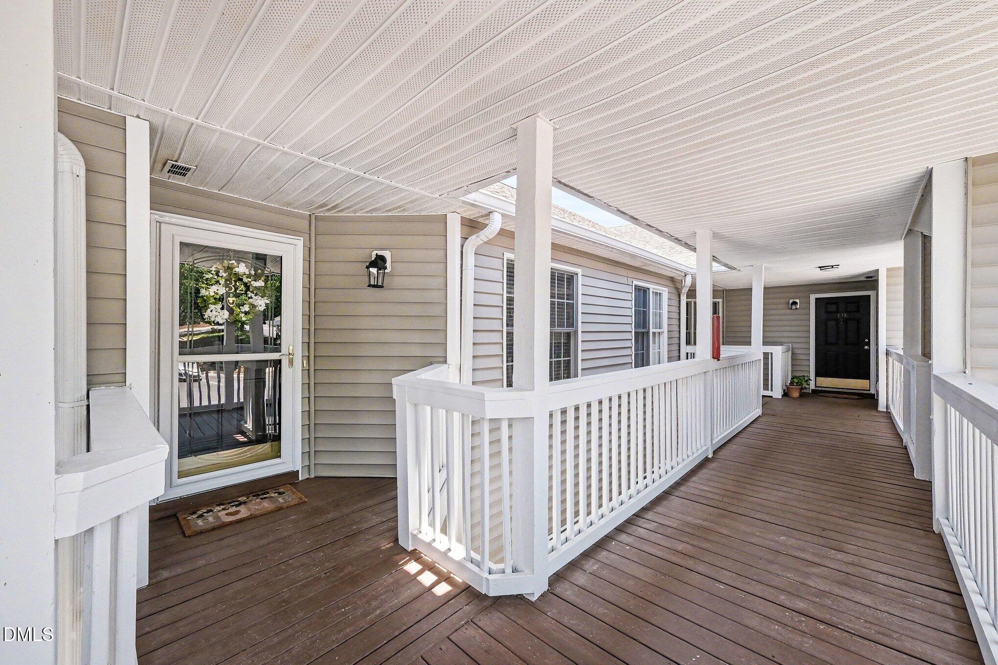132 Springfork Drive Cary, NC 27513 - Photo 8 of 28 a view of a house with wooden deck
