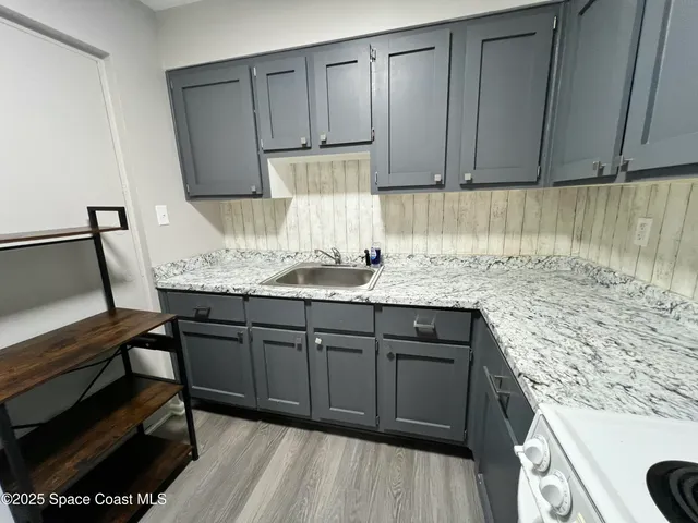 a view of multiple house with a yard