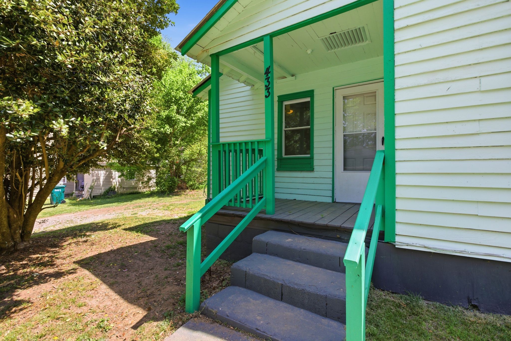 433 Jones Street Pulaski, TN 38478 - Photo 5 of 25 a view of a house with a small yard