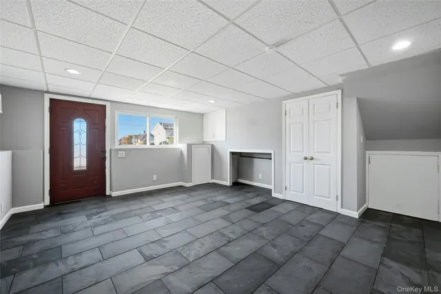 a view of an empty room and window