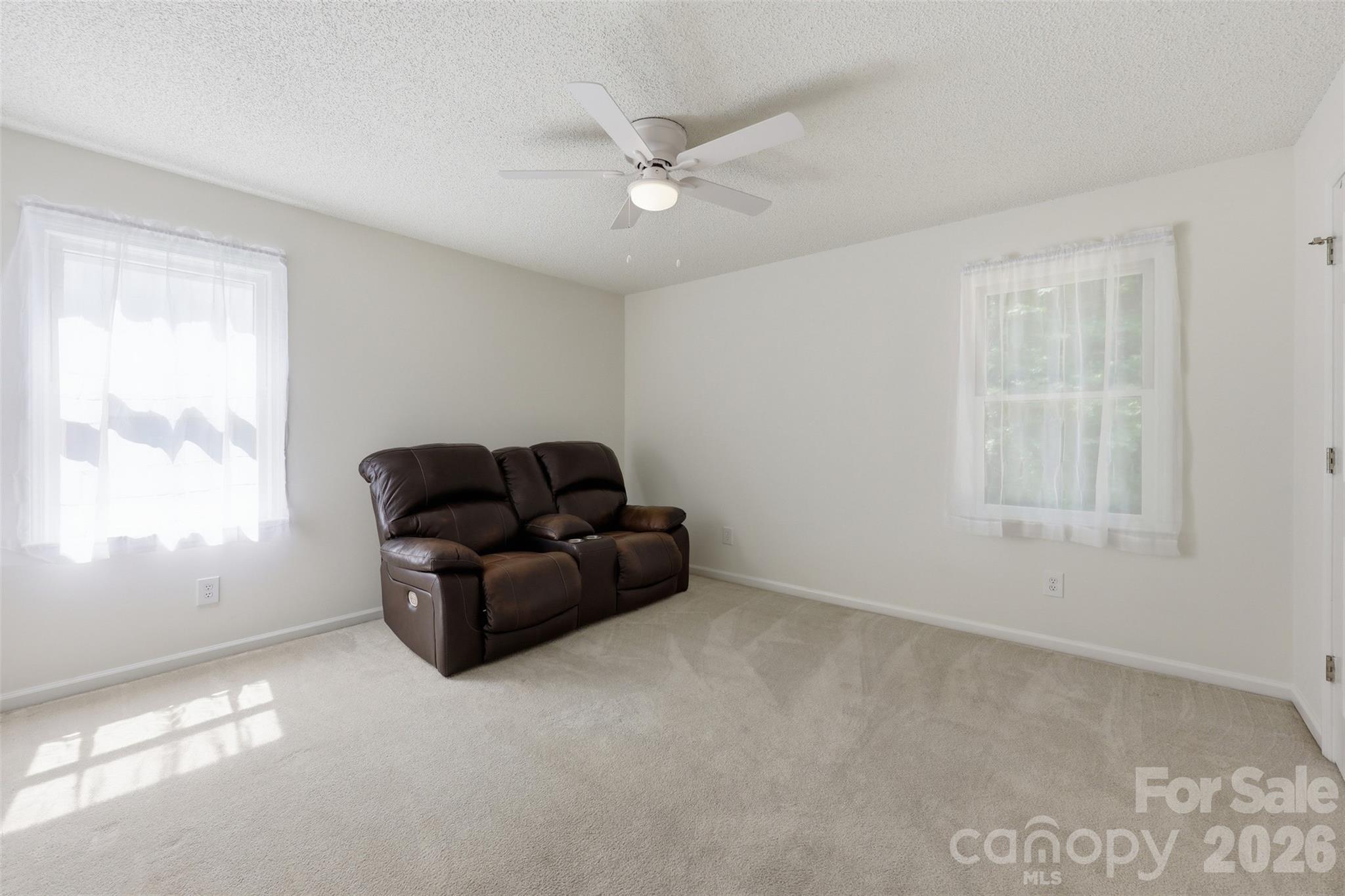 913 Pleasant Ridge Road Fort Mill, SC 29715 - Photo 19 of 40 a living room with furniture and a window