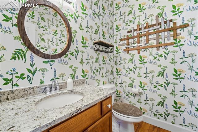 8795 Moss Rock Road Colorado Springs, CO 80908 - Photo 19 of 47 Charming Powder Bathroom