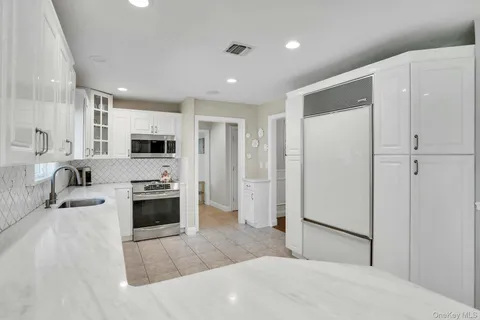 $1,299,000 | 65 Shoreham Drive East, Dix Hills, NY 11746