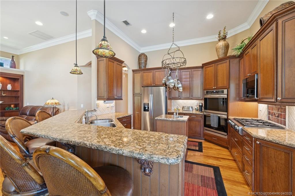 2492 North W Everglades Boulevard Stuart, FL 34994 - Photo 23 of 72 Double Sink and Prep Island with Sin