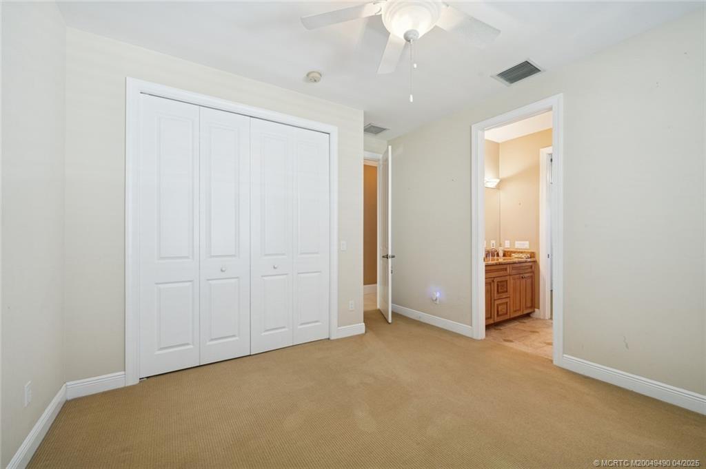 2492 North W Everglades Boulevard Stuart, FL 34994 - Photo 36 of 72 Guest Suite with Jack & Jill Bathroom