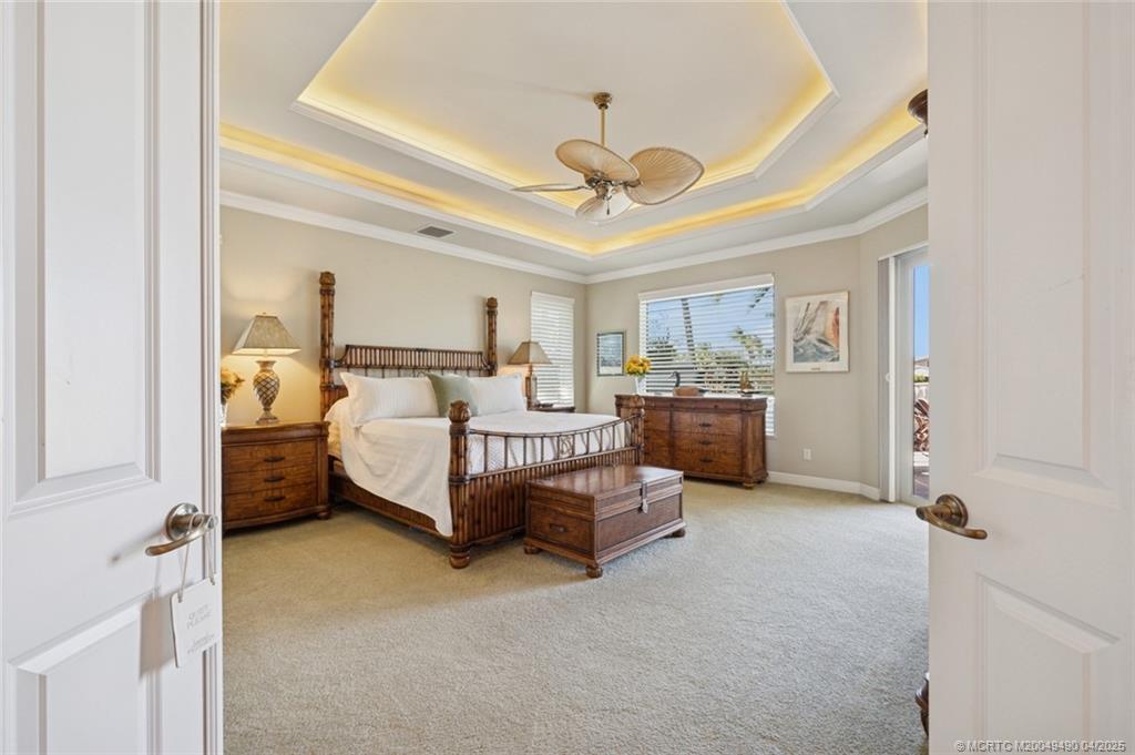 2492 North W Everglades Boulevard Stuart, FL 34994 - Photo 43 of 72 Primary Suite with Door to Pool and Spa