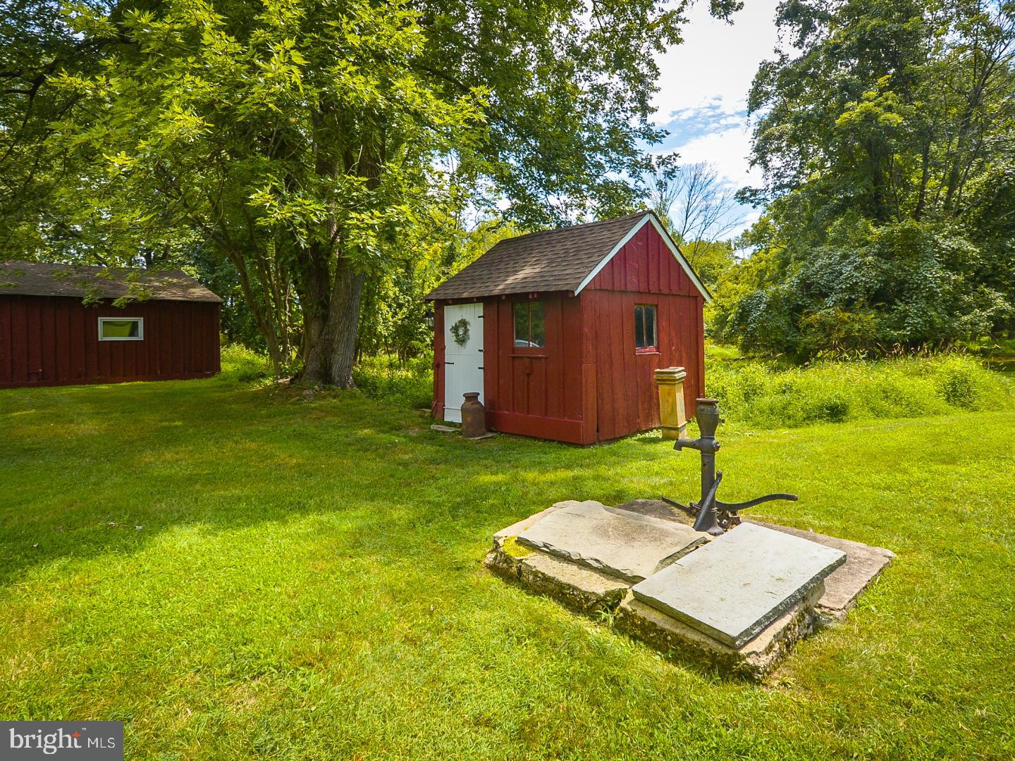 2710 Village Road Langhorne, PA 19047 - Photo 29 of 32 Milk house and old well pump
