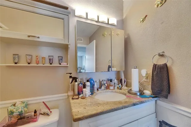 a potted plant sitting in front of a door