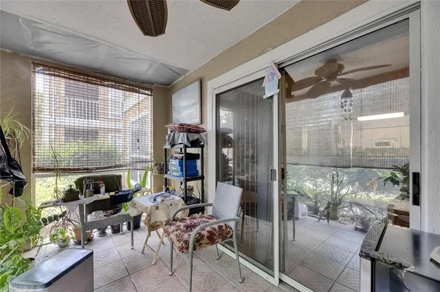 a bedroom with furniture and a chandelier