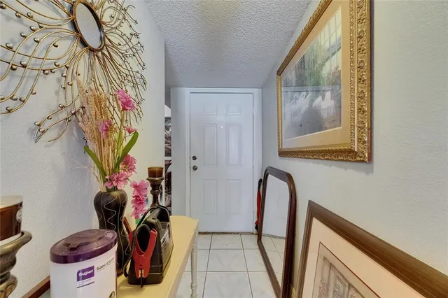 a bathroom with a mirror and a shower curtain