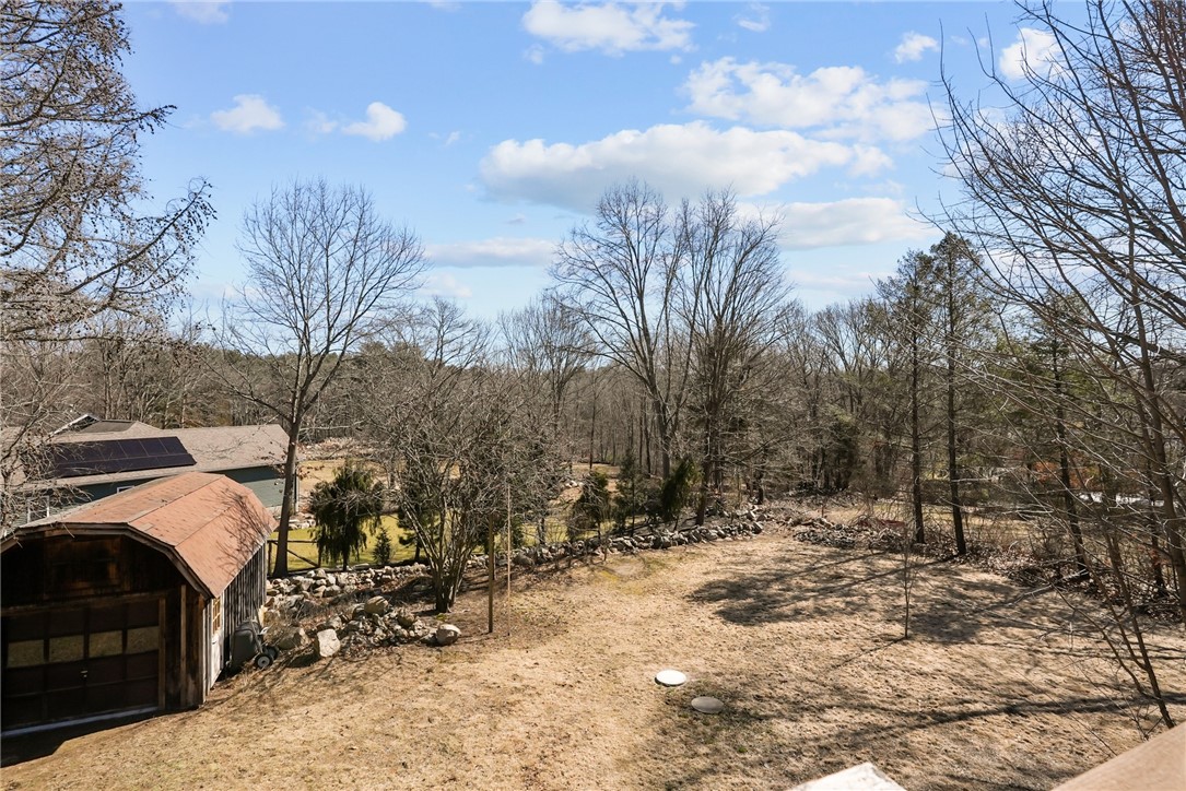 215 Blackrock Road Coventry, RI 02816 - Photo 23 of 39 yard and garage -plenty of sun