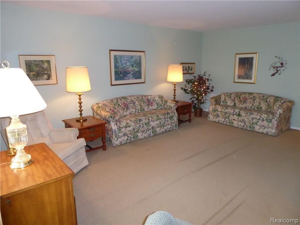 1199 South Sheldon Road, Unit L86 Plymouth, MI 48170 - Photo 8 of 38 Living Room 3-1.jpg