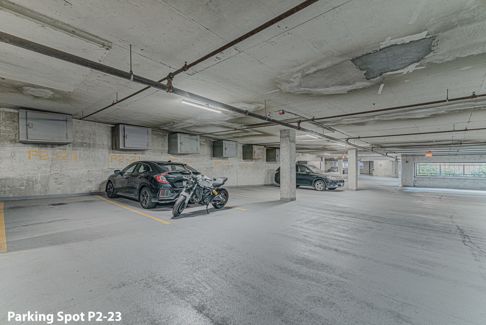1500 West Monroe Street, Unit 517 Chicago, IL 60607 - Photo 23 of 26 a view of a garage with parked cars