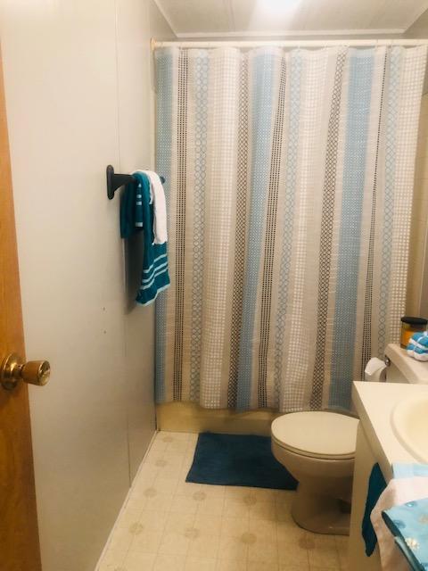 1315 Depot Road Blue Ridge, VA 24064 - Photo 13 of 17 a bathroom with a toilet and a shower