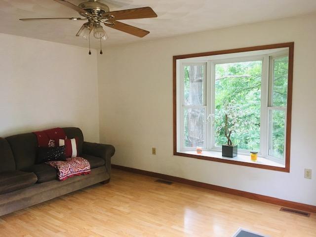1315 Depot Road Blue Ridge, VA 24064 - Photo 17 of 17 a living room with furniture and a window