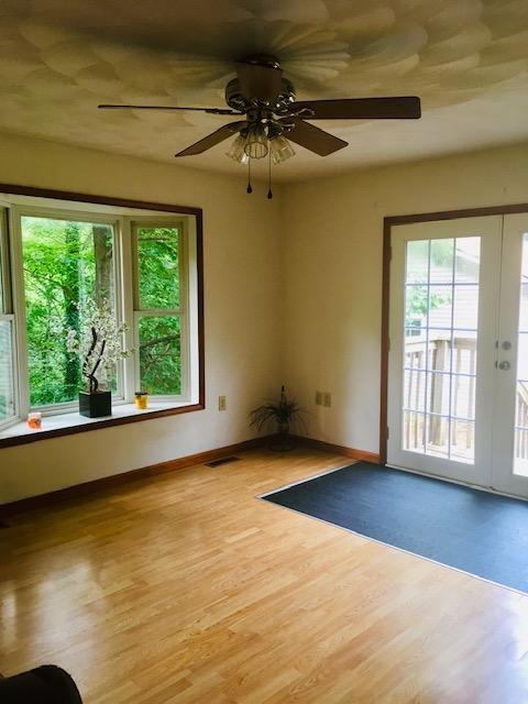 1315 Depot Road Blue Ridge, VA 24064 - Photo 7 of 17 a view of an empty room with a window