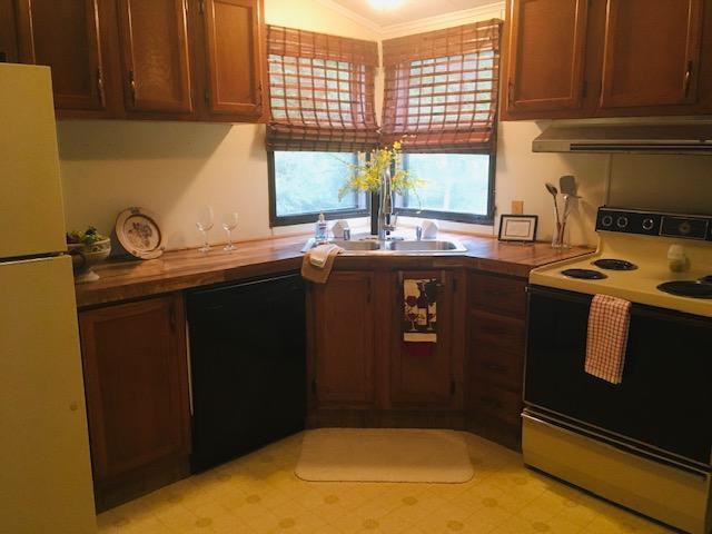 1315 Depot Road Blue Ridge, VA 24064 - Photo 8 of 17 a kitchen with a sink a stove and cabinets