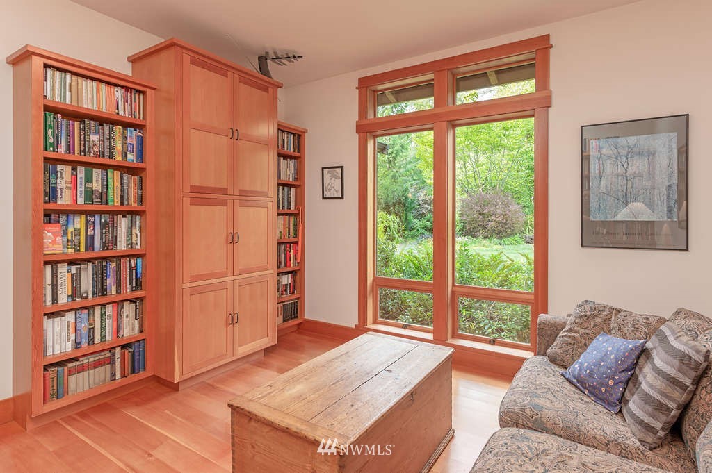 18132 Thorsen Road Southwest Vashon, WA 98070 - Photo 16 of 40 a living room with furniture and a window