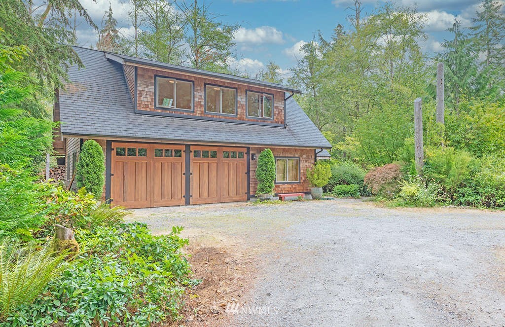 18132 Thorsen Road Southwest Vashon, WA 98070 - Photo 34 of 40 a front view of a house with garden
