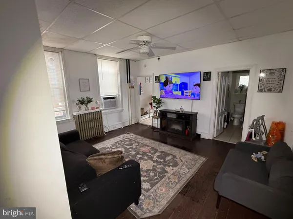 a living room with furniture and a couch