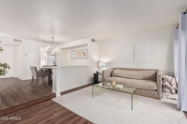 a view of a door and wooden floor