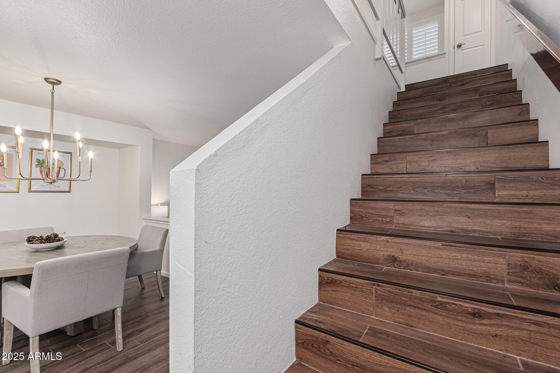 8700 East Mountain View Road, Unit 1039 Scottsdale, AZ 85258 - Photo 18 of 37 a view of entryway and hall with wooden floor