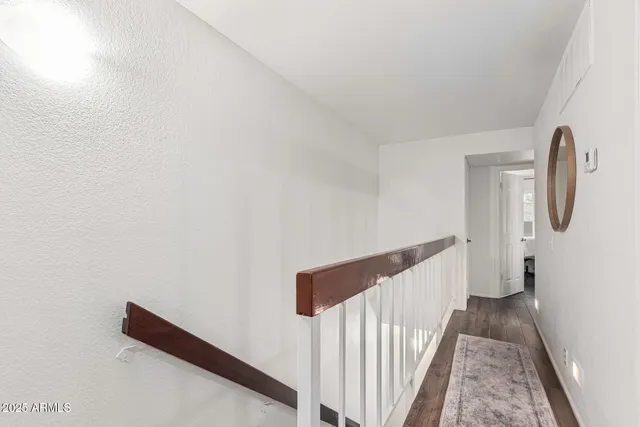 a kitchen with stainless steel appliances a stove microwave and sink