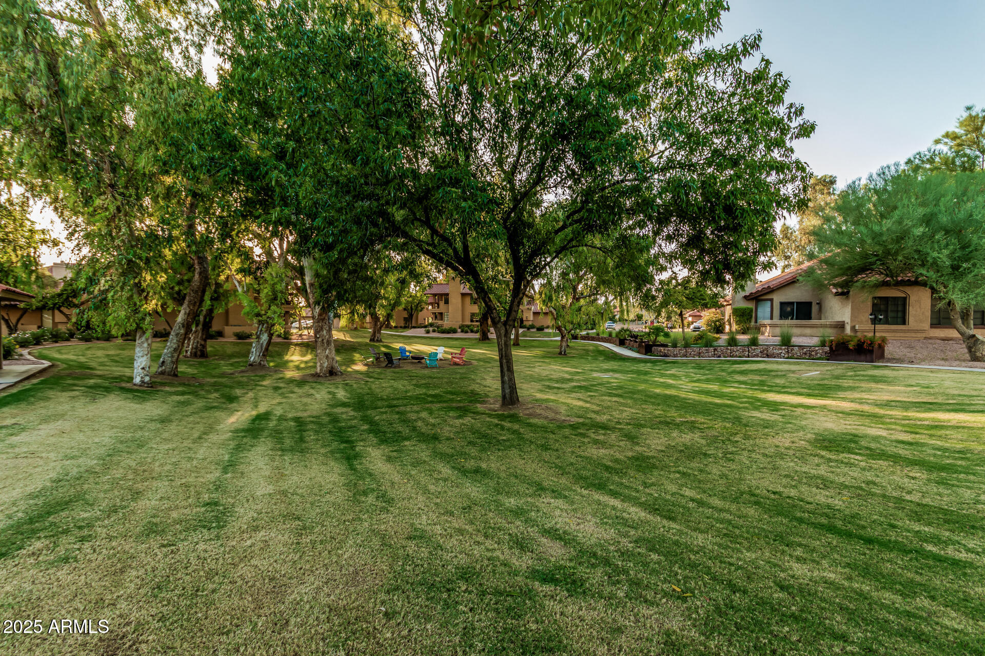 8700 East Mountain View Road, Unit 1039 Scottsdale, AZ 85258 - Photo 30 of 37 a front view of a house with a yard