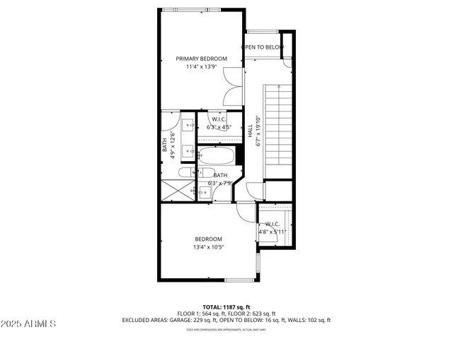 a view of a patio with couches table and chairs under an umbrella with a fire pit