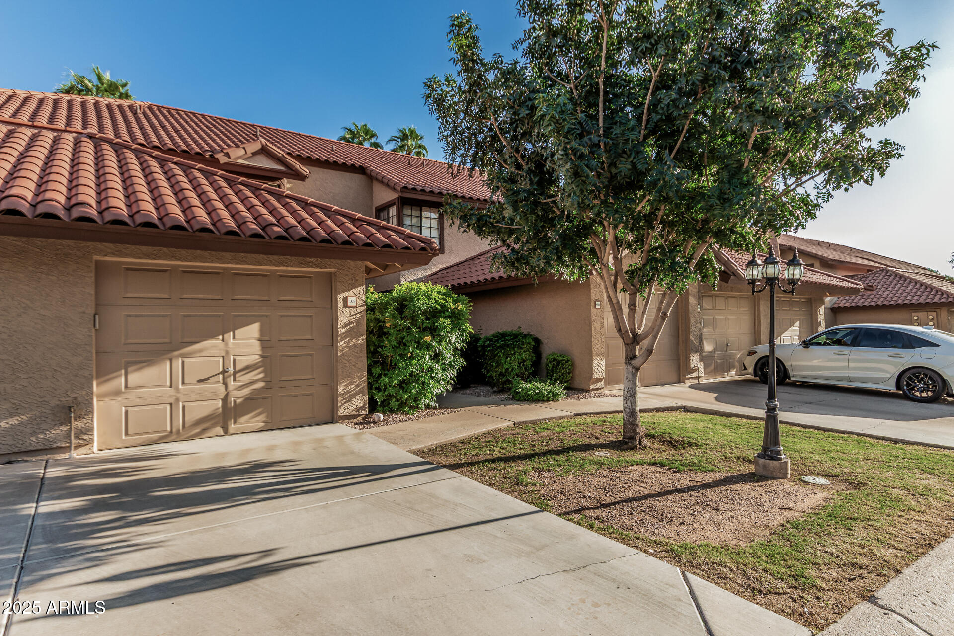 8700 East Mountain View Road, Unit 1039 Scottsdale, AZ 85258 - Photo 3 of 37 a front view of a house with parking area