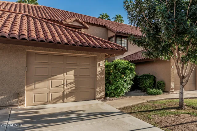a picture of a bench in front of a wall