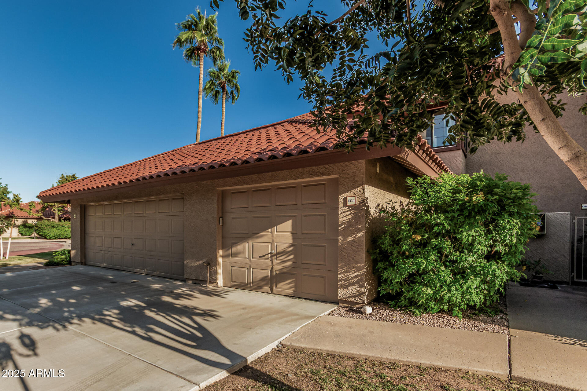 8700 East Mountain View Road, Unit 1039 Scottsdale, AZ 85258 - Photo 6 of 37 a view of a house with a garage
