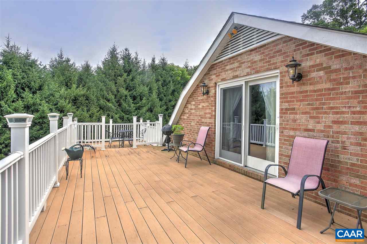 64 Horseshoe Hill Road Ruckersville, VA 22968 - Photo 13 of 33 a view of deck with chairs and wooden floor
