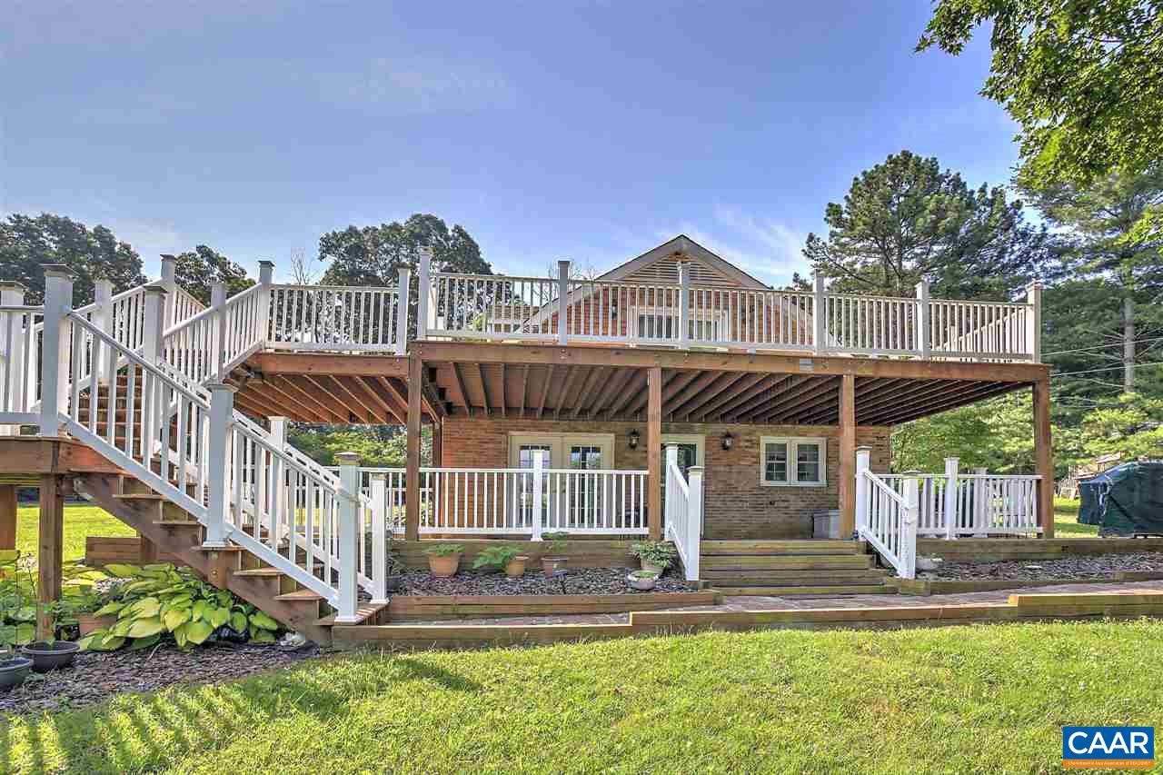 64 Horseshoe Hill Road Ruckersville, VA 22968 - Photo 20 of 33 a front view of a house with a yard
