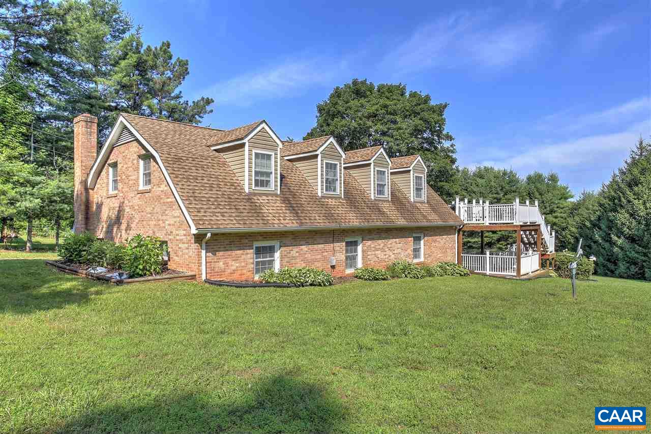 64 Horseshoe Hill Road Ruckersville, VA 22968 - Photo 21 of 33 a view of a house with a big yard potted plants and large tree