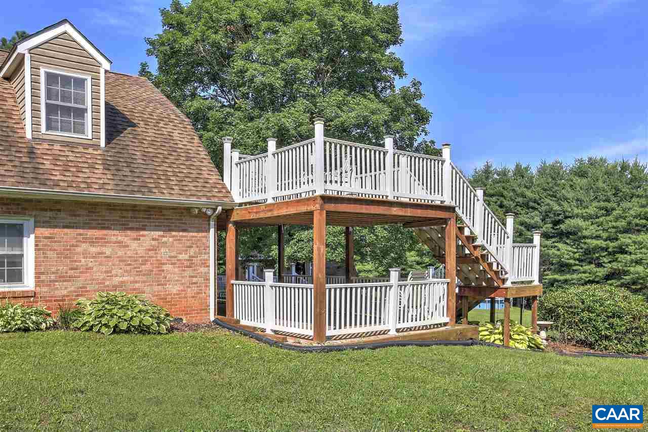 64 Horseshoe Hill Road Ruckersville, VA 22968 - Photo 23 of 33 a view of a house with a yard and deck