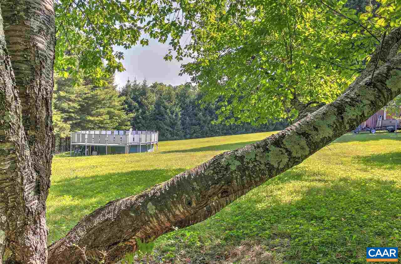 64 Horseshoe Hill Road Ruckersville, VA 22968 - Photo 28 of 33 a view of a yard with a swimming pool