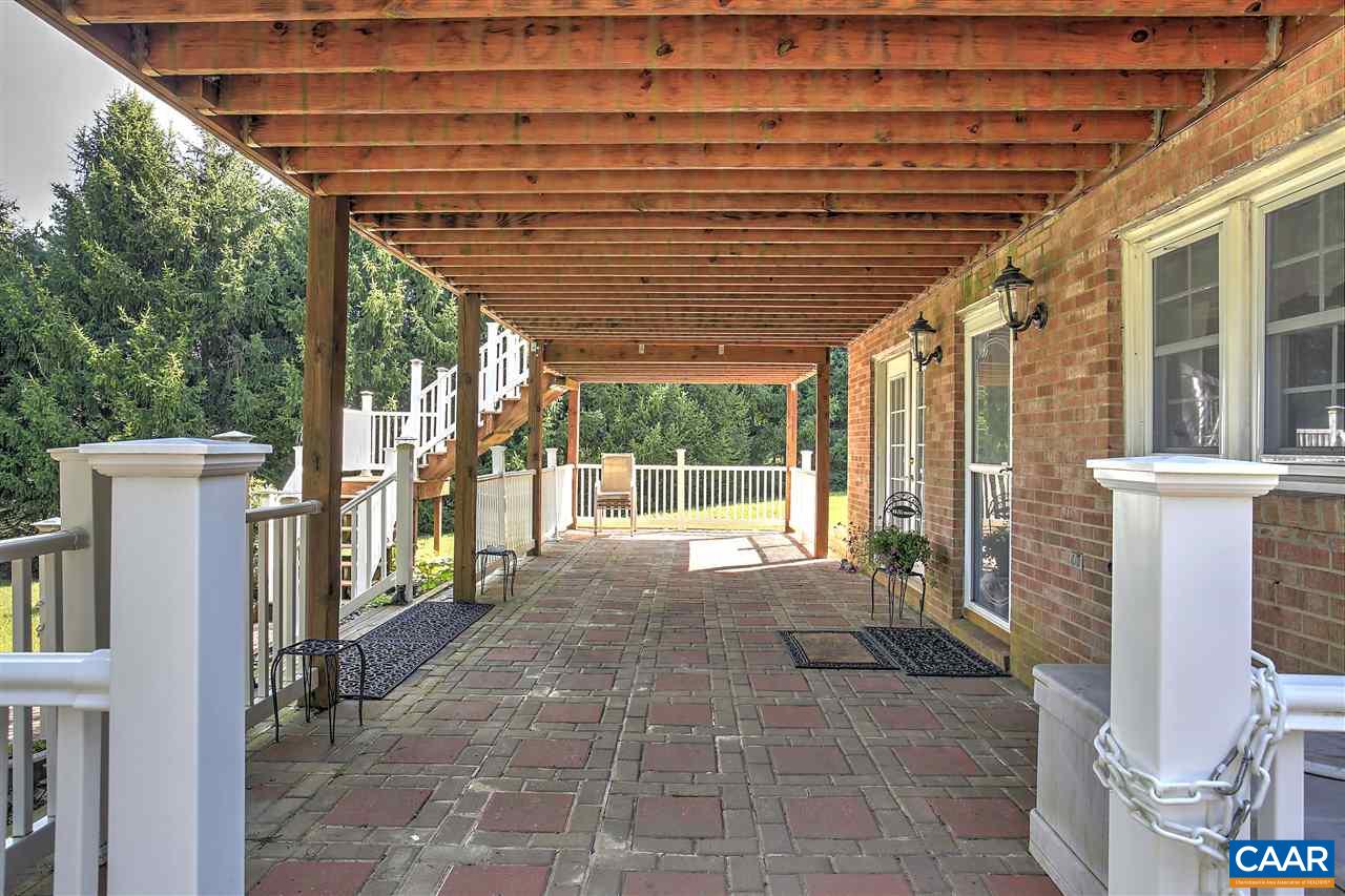 64 Horseshoe Hill Road Ruckersville, VA 22968 - Photo 3 of 33 a porch with seating space
