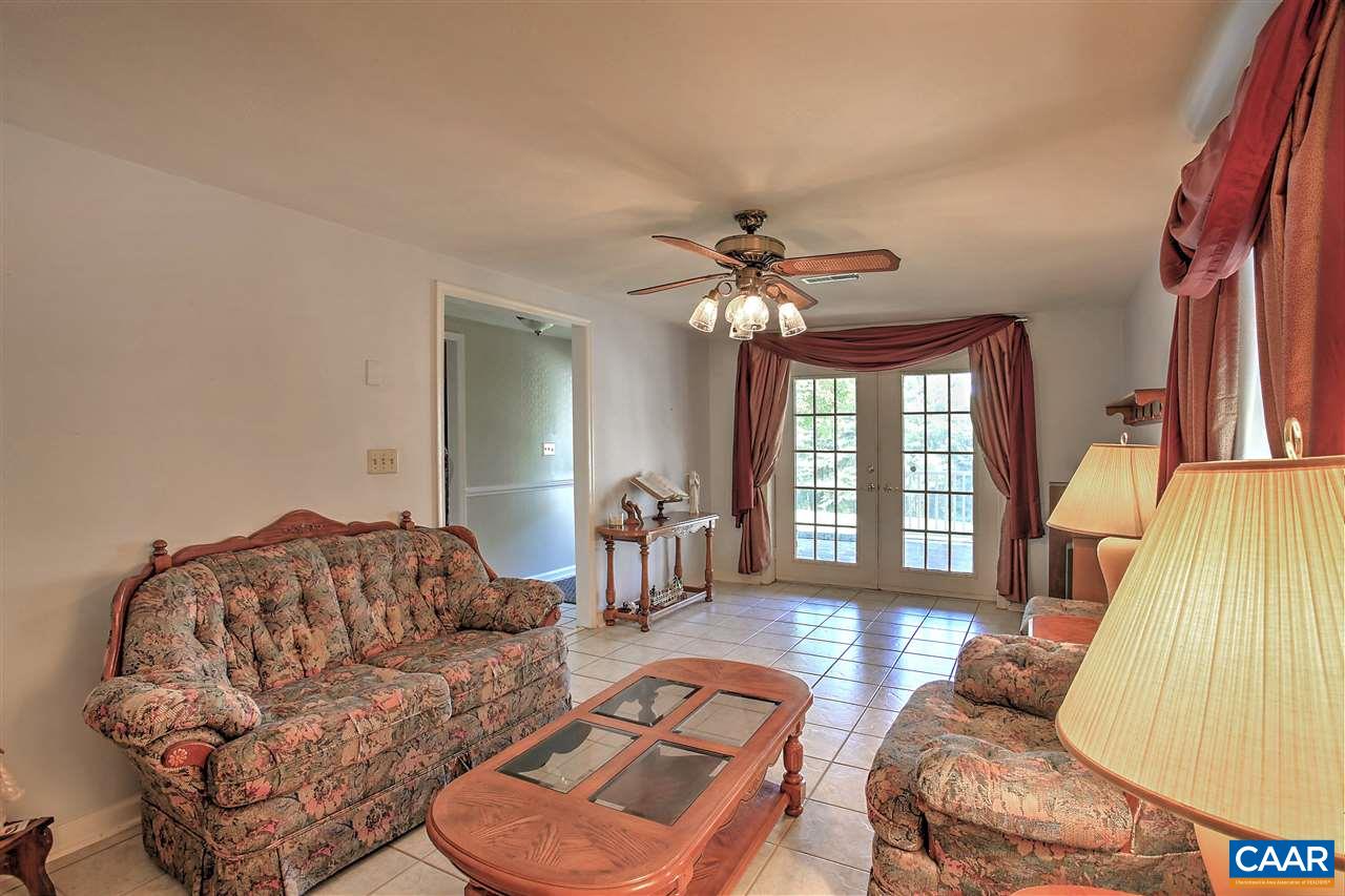 64 Horseshoe Hill Road Ruckersville, VA 22968 - Photo 8 of 33 a living room with furniture and wooden floor
