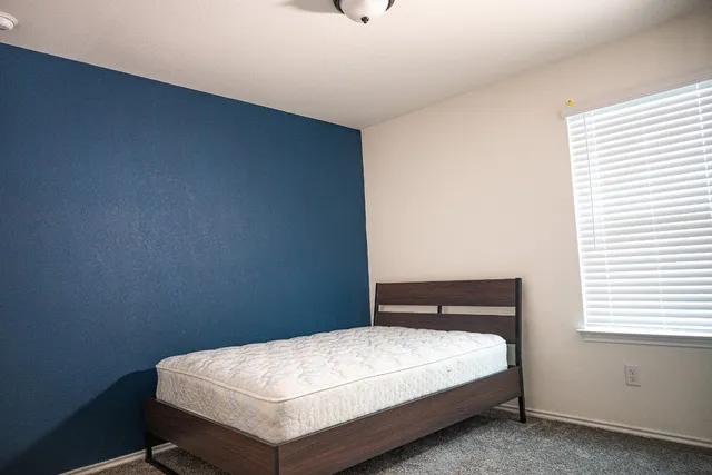 a bathroom with a sink mirror toilet and bathtub