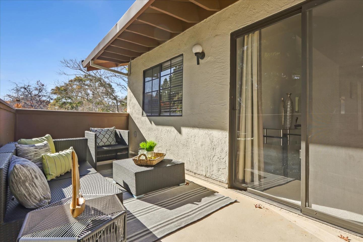 430 Costa Mesa Terrace, Unit E Sunnyvale, CA 94085 - Photo 23 of 40 a living room with furniture