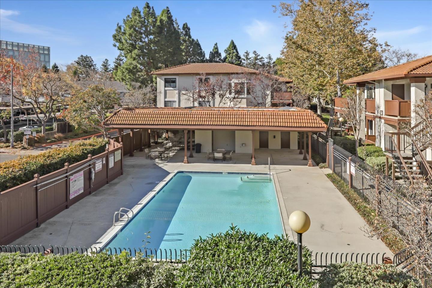 430 Costa Mesa Terrace, Unit E Sunnyvale, CA 94085 - Photo 32 of 40 a view of a house with a yard balcony and furniture