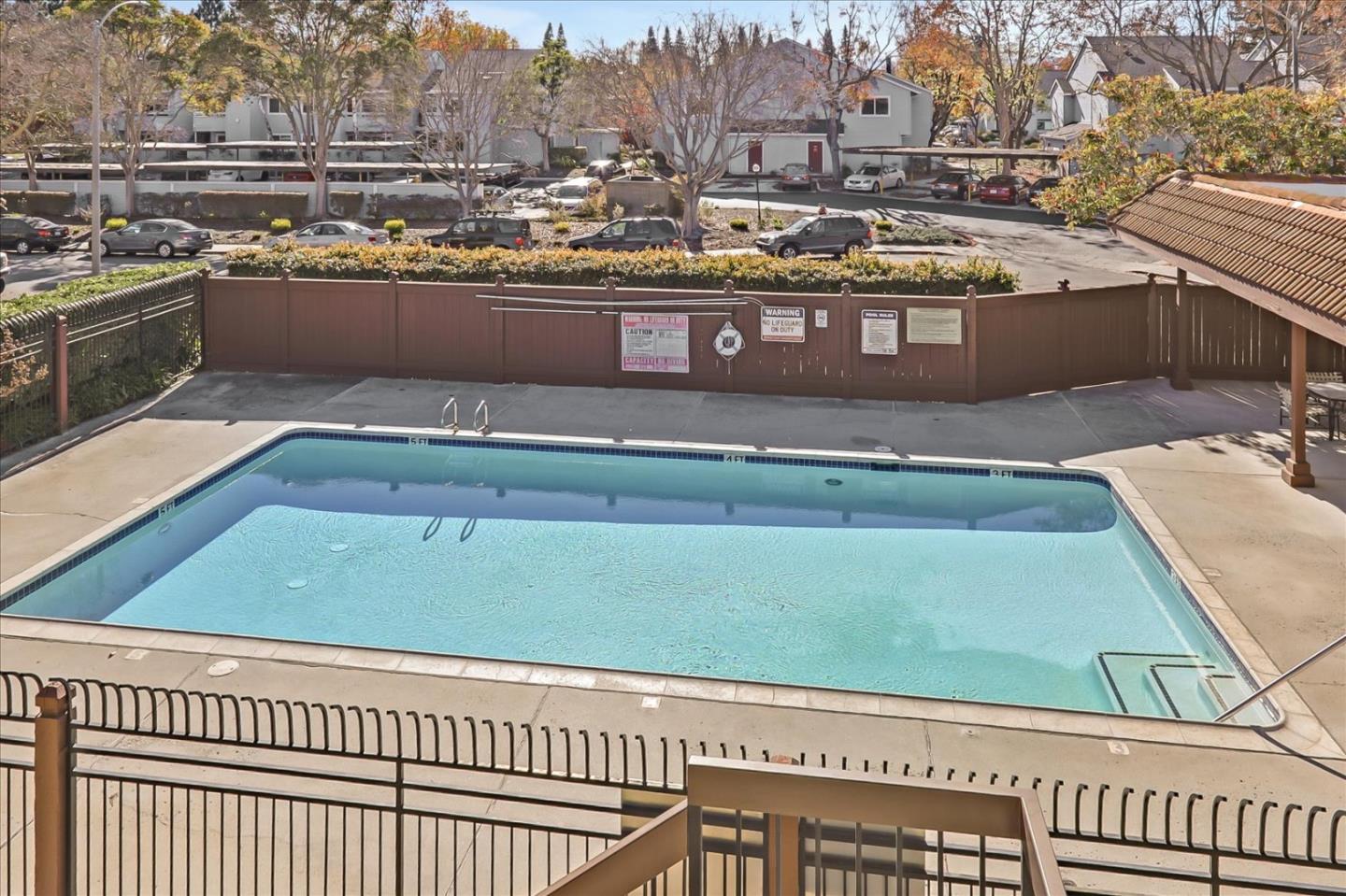 430 Costa Mesa Terrace, Unit E Sunnyvale, CA 94085 - Photo 33 of 40 a view of a swimming pool with outdoor seating