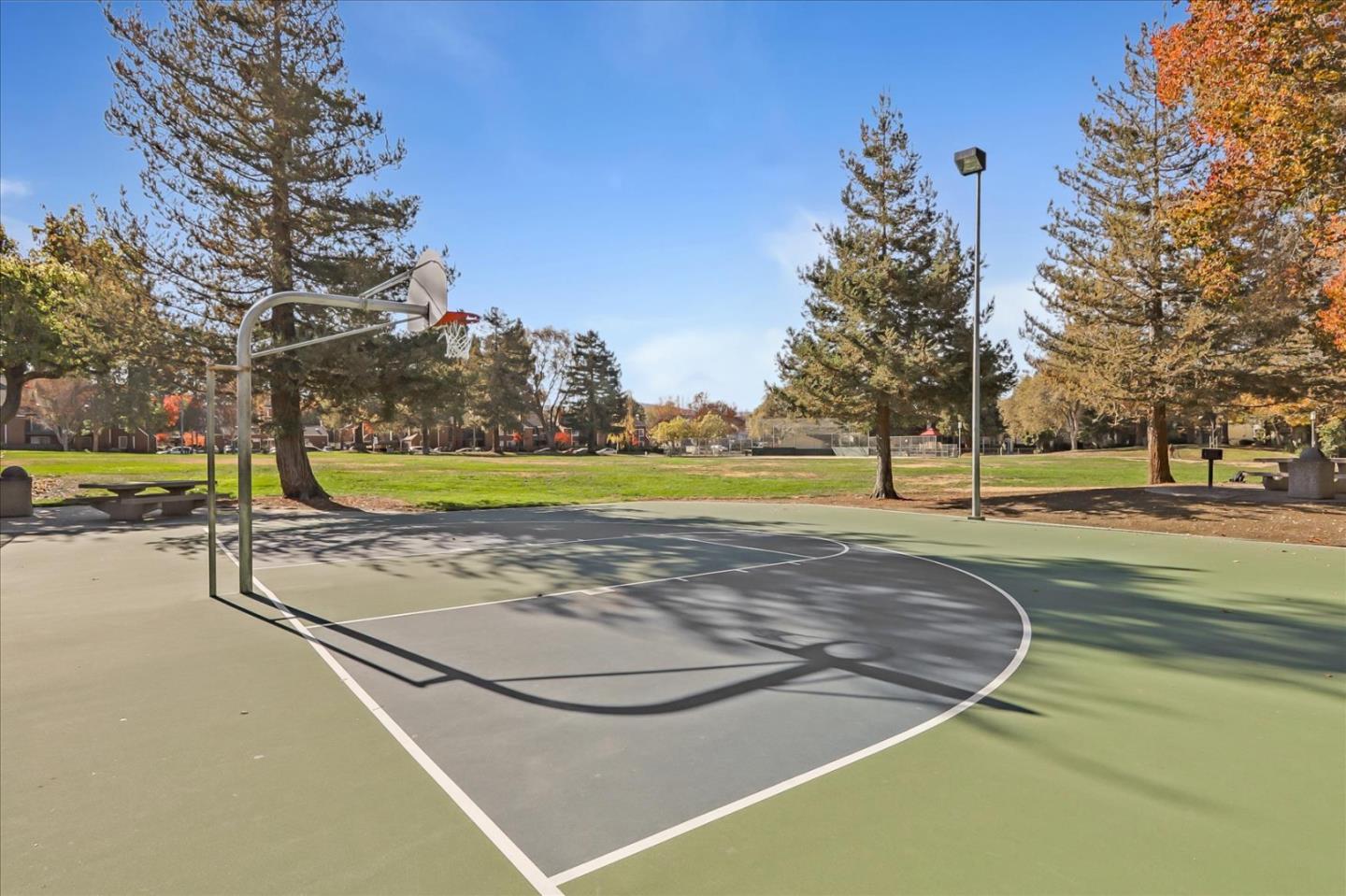 430 Costa Mesa Terrace, Unit E Sunnyvale, CA 94085 - Photo 36 of 40 a view of a playground with basketball court